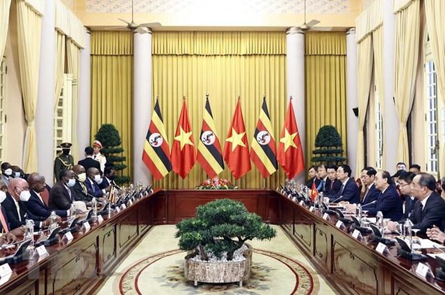 President hosts welcome ceremony for Ugandan counterpart - Ảnh 5.